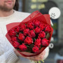 19 червоних півонієвидних тюльпанів у букеті «Пристрасне вітання»