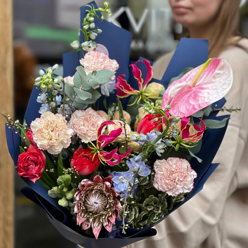 Unusual exotic bouquet with protea «Princess' Evening»