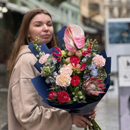 Unusual exotic bouquet with protea «Princess' Evening»