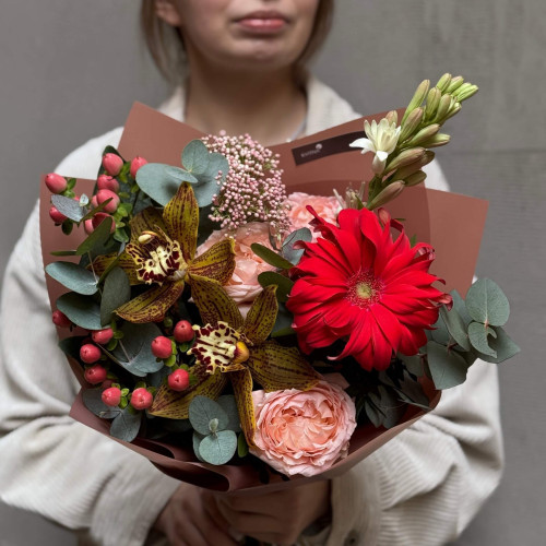 Interesting bouquet with gerbera and cymbidiums «Passionate Compliment»