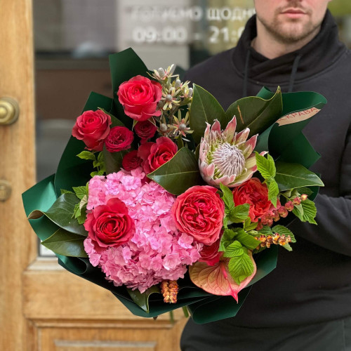 Interesting bouquet with peony roses and protea «Bright Olena»