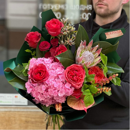 Interesting bouquet with peony roses and protea «Bright Olena»