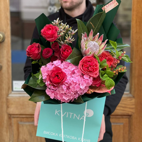 Interesting bouquet with peony roses and protea «Bright Olena»