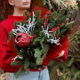 Winter bouquet of pine branches with protea «Winter Star»