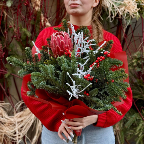 Winter bouquet of pine branches with protea «Winter Star»