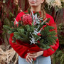 Winter bouquet of pine branches with protea «Winter Star»