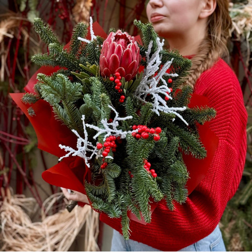 Winter bouquet of pine branches with protea «Winter Star»