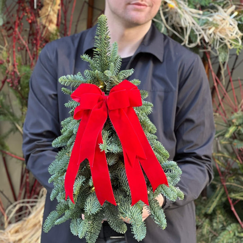 Festive Christmas tree with a garland «Dream Christmas»