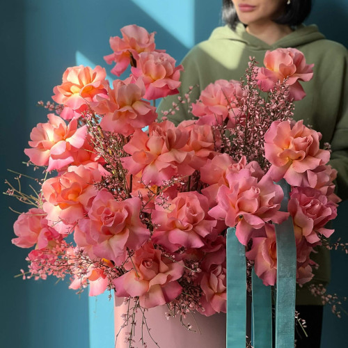 Romantic composition of twisted roses and fragrant genista «Incredible Love»