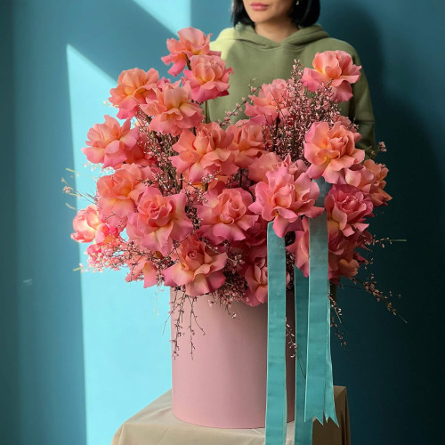 Romantic composition of twisted roses and fragrant genista «Incredible Love»