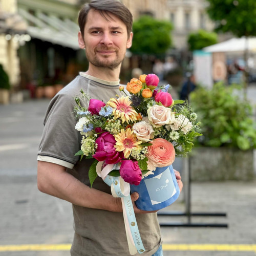 Composition in a box with peonies and gerberas «Enchanted Meadow»