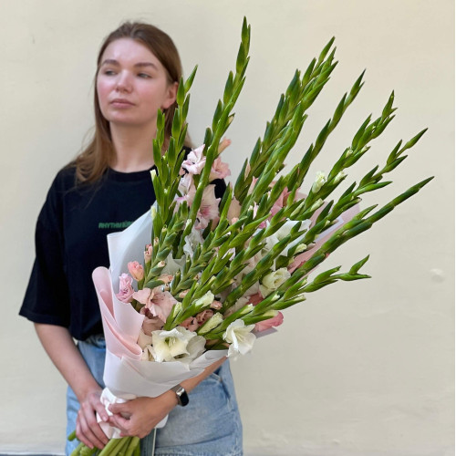Delicate light bouquet of 23 tender gladioluses «Glistening Pink Radiance»