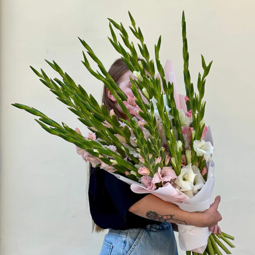 Delicate light bouquet of 23 tender gladioluses «Glistening Pink Radiance»