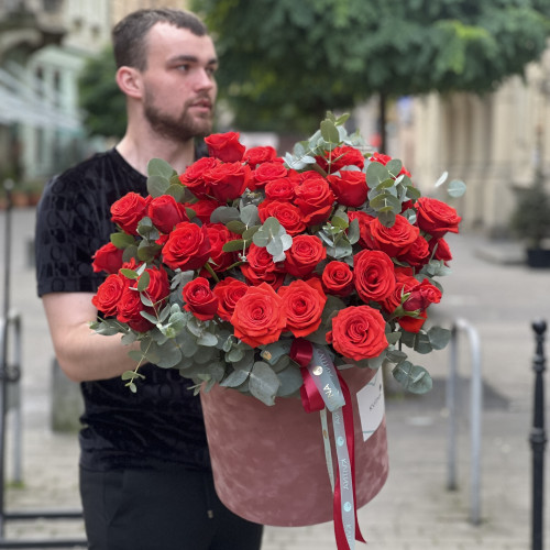 65 bright red Nina roses in the composition «Flame of Love»