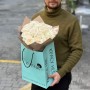 15 изысканных парфюмированных пионовидных роз White O'Hara в букете «Неземное искущение»