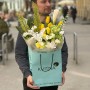 Interesting tiered bouquet in lemon and white tones «Capri Panoramas»
