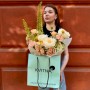 Warm bouquet with eremurus «Cream Sun»