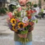 Colorful meadow-style bouquet with sunflowers «Olya's Laughter»