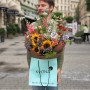 Colorful meadow-style bouquet with sunflowers «Olya's Laughter»