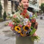 Colorful meadow-style bouquet with sunflowers «Olya's Laughter»