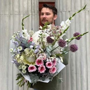 Luxurious voluminous bouquet with protea «The Whole World for Olya»