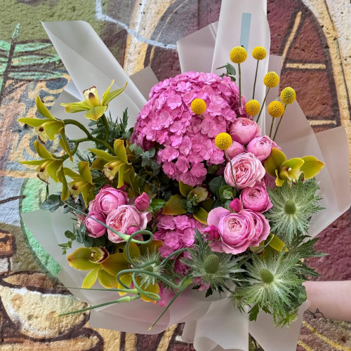 Bright exotic bouquet with cymbidium and peony roses «Taste of the Sun»