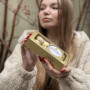 Ferrero Rocher — girls love these exquisite crunchy candies in golden packaging (100 g.)