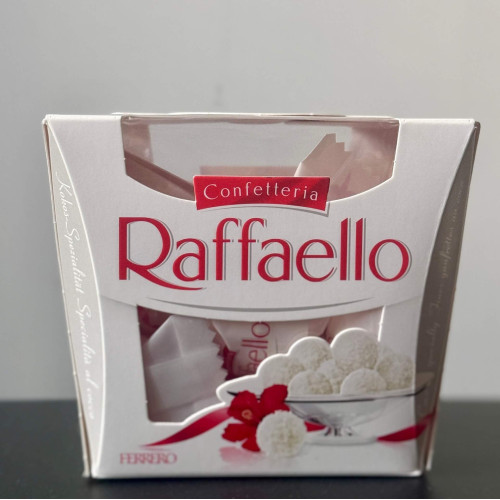Raffaello — popular candies with coconut chips, white chocolate and almonds (150 g.)