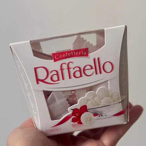 Raffaello — popular candies with coconut chips, white chocolate and almonds (150 g.)