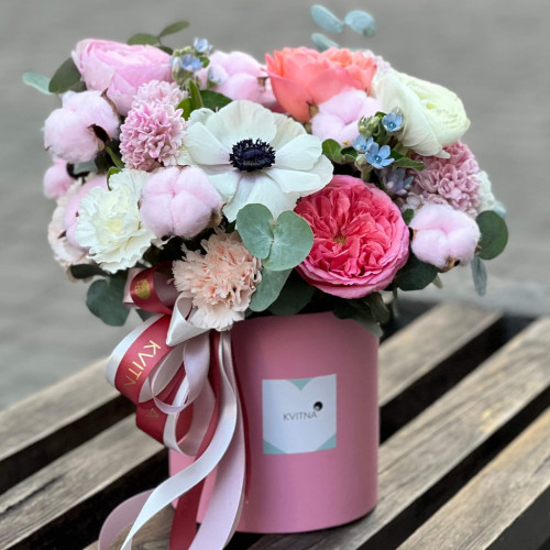 Composition in a box with hyacinths and gossypium «Pink Cloud»