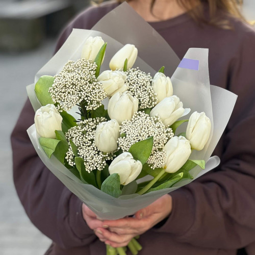 Delicate bouquet of tulips and ozothamnus «Spring Sky»